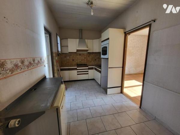 Etupes, maison plain pied cinq pièces
