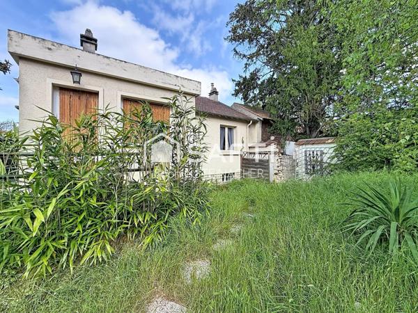 Maison sur beau terrain avec potentiel