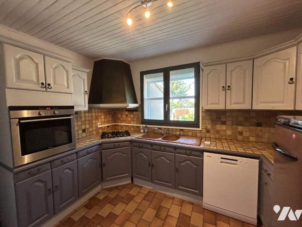 Maison 2 niveaux 3 chambres garage jardin