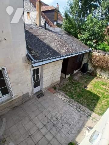 Belle maison de ville avec jardin et caves