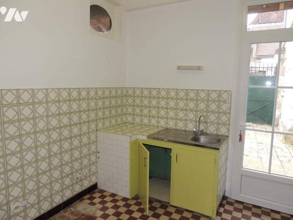 Belle maison de ville avec jardin et caves