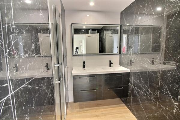 Appartement 3 pièces de 69 m2 avec balcon, cave et parking à vendre à POISSY (78)