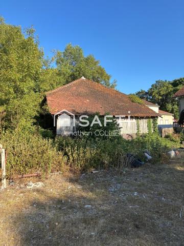 Terrain avec hangar environ 180m2, accès camions