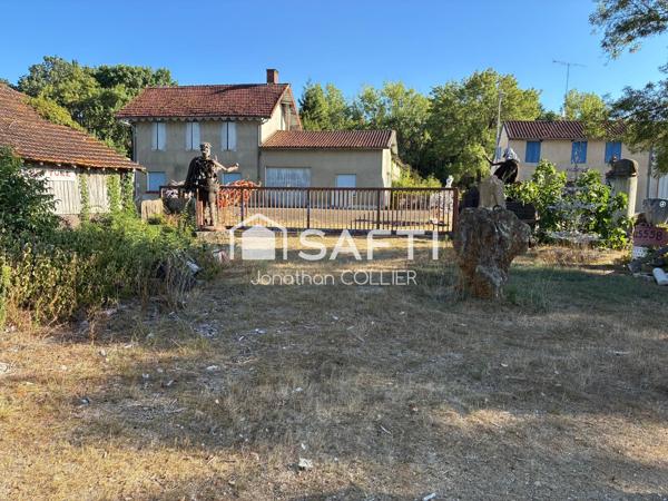 Terrain avec hangar environ 180m2, accès camions