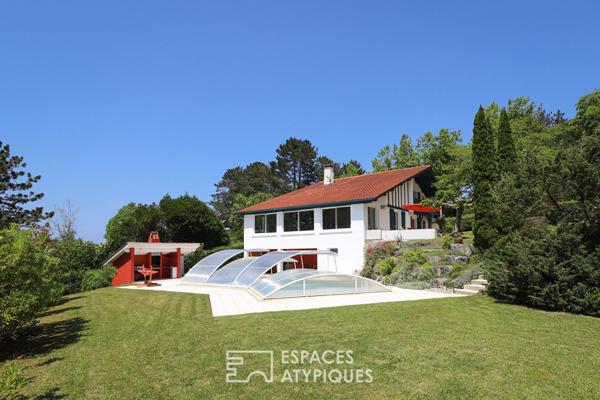 Villa élégante nichée dans un parc arboré