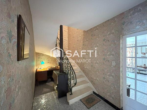 Maison de bourg avec garage et grand atelier