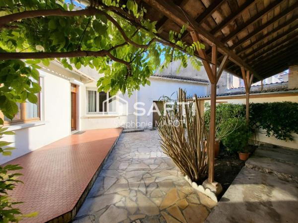 Maison de bourg avec garage et grand atelier