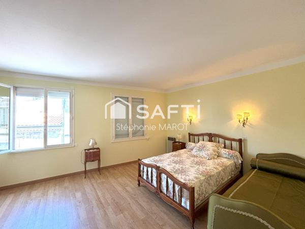 Maison de bourg avec garage et grand atelier