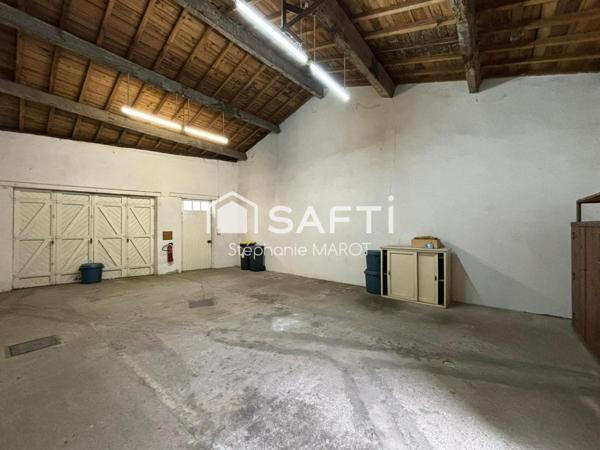 Maison de bourg avec garage et grand atelier