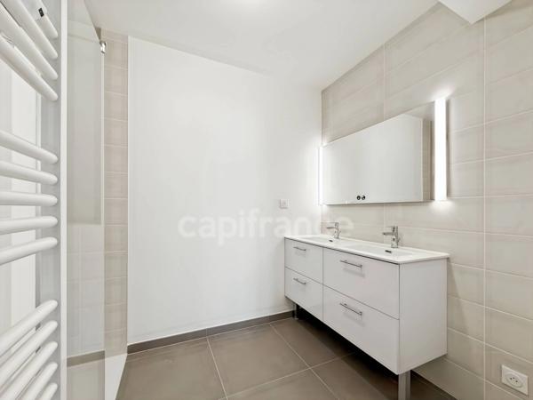 Appartement à vendre 5 pièces DIVONNE LES BAINS (01) - 108m2 - terrasse, jardin clos, cave, 1 garage fermé.