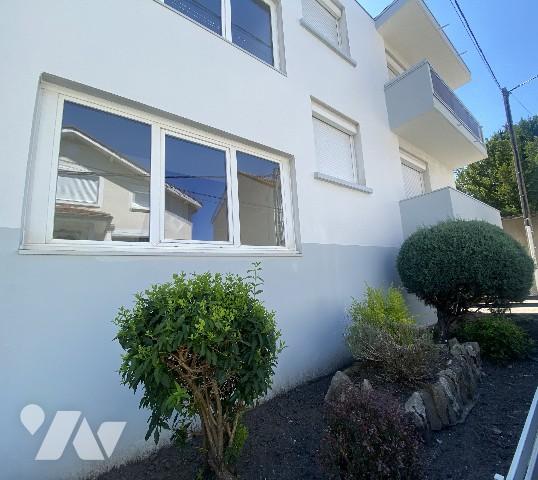 Appartement de 65m² habitables avec balcons, garage et place de parking