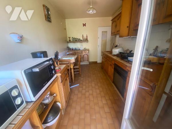 Appartement de 65m² habitables avec balcons, garage et place de parking