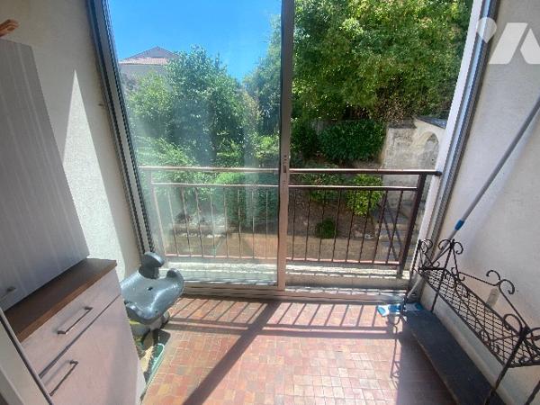 Appartement de 65m² habitables avec balcons, garage et place de parking
