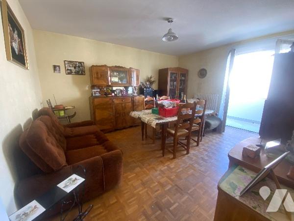 Appartement de 65m² habitables avec balcons, garage et place de parking