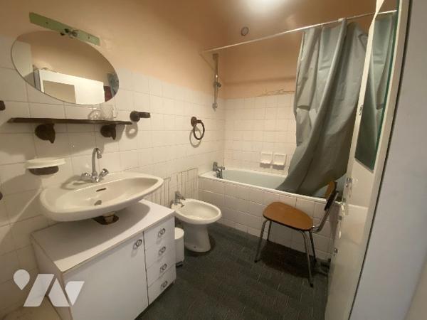 Appartement de 65m² habitables avec balcons, garage et place de parking