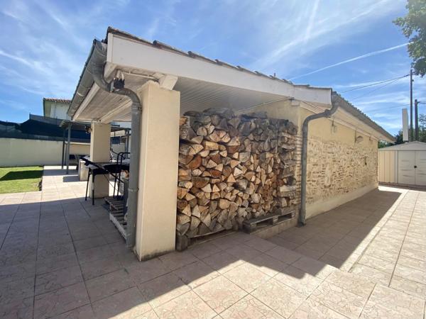 Maison de caractère avec vaste espace de vie et jardin clôturé