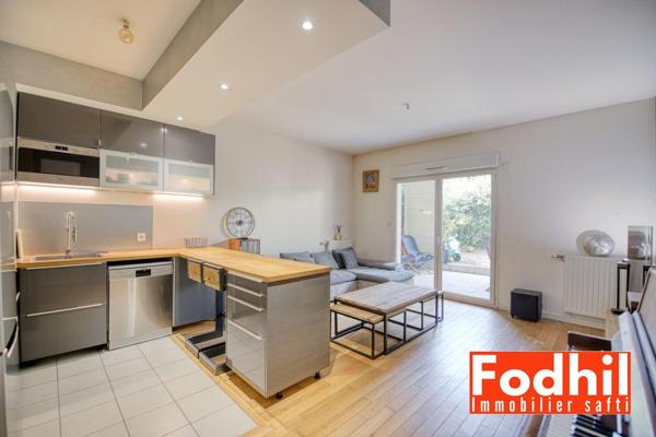 Appartement 3 pièces 62 m² avec terasse et jardin, parking et cave.
