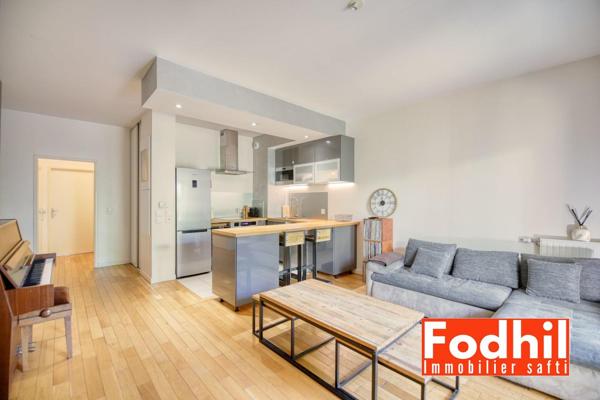 Appartement 3 pièces 62 m² avec terasse et jardin, parking et cave.