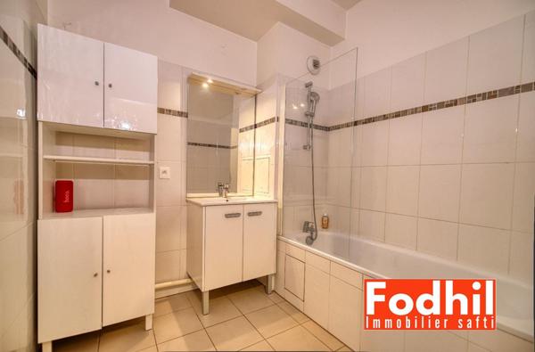Appartement 3 pièces 62 m² avec terasse et jardin, parking et cave.