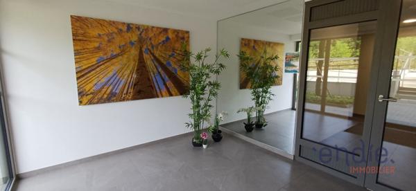 Appartement 3 pièces de 77,20 m² avec terrasse de 55 m² et jardin privatif de 146 m²