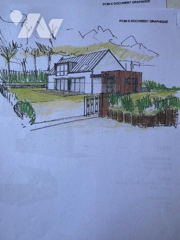 A VENDRE à LOUANNEC, un terrain à bâtir de 872 m² sur lequel existe un permis de construire, pu...