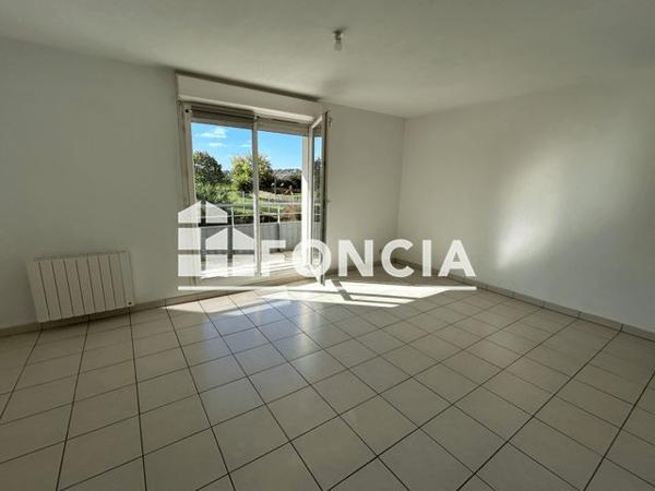 Location Appartement 3 pièces 53.33 m² - 21 AVENUE DES NATIONS Onet Le Chateau 12850