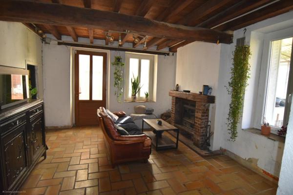 Maison à rénover avec terrain et potentiel