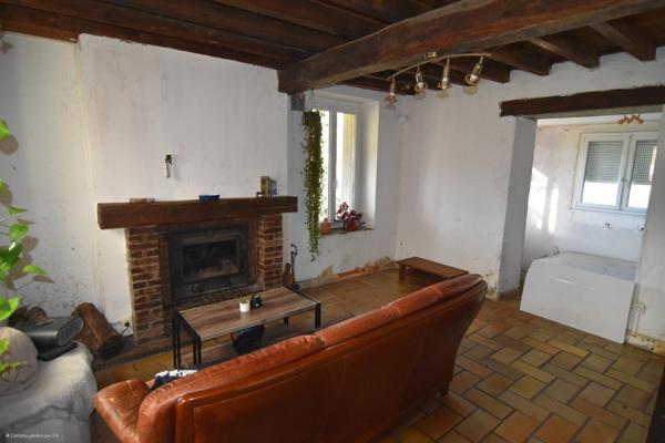 Maison à rénover avec terrain et potentiel
