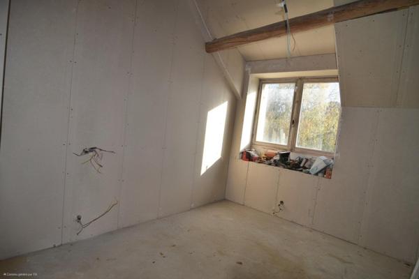 Maison à rénover avec terrain et potentiel