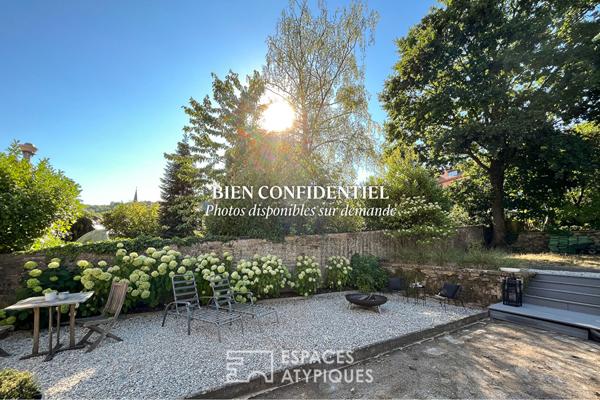 Maison bourgeoise et son jardin en coeur de ville