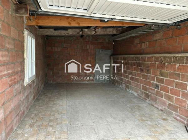 Maison de plain-pied avec dépendance et garage