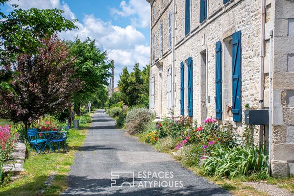 La vie au fil de l’eau: grande maison bourgeoise en coeur de village