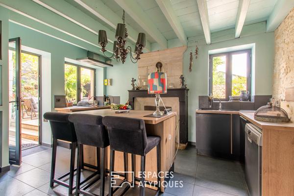 La vie au fil de l’eau: grande maison bourgeoise en coeur de village