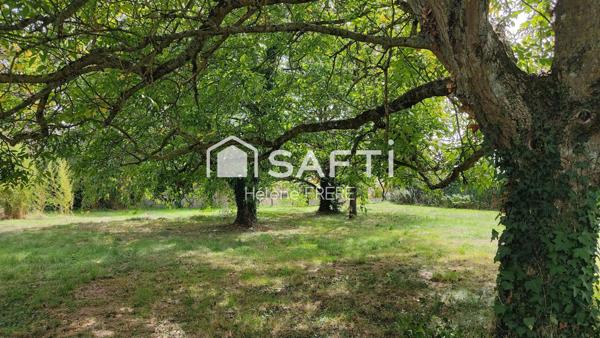 Beau terrain diffus à proximité des commerces et services