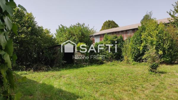 Beau terrain diffus à proximité des commerces et services