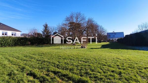 Beau terrain diffus à proximité des commerces et services