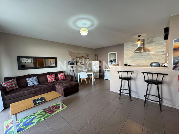 Appartement T2 proximité centre-ville - 51m² avec terrasse et place de parking