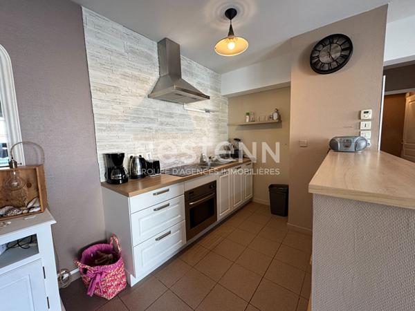 Appartement T2 proximité centre-ville - 51m² avec terrasse et place de parking