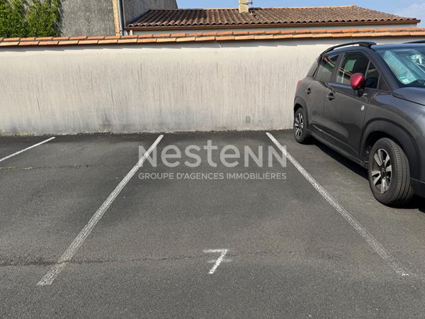 Appartement T2 proximité centre-ville - 51m² avec terrasse et place de parking