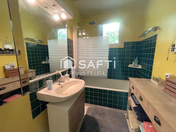 Maison en trés bon état avec sous-sol et jardin