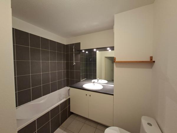 Parking + appartement