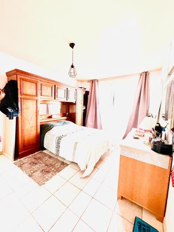 GRAND APPARTEMENT DE TYPE 3 PROCHE DES COMMODITES