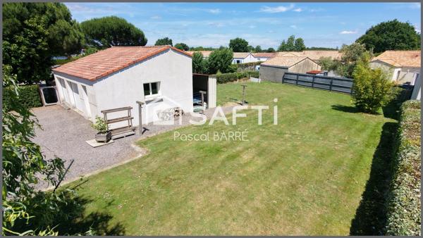 Terrain à bâtir avec garage – St-Julien-des-Landes